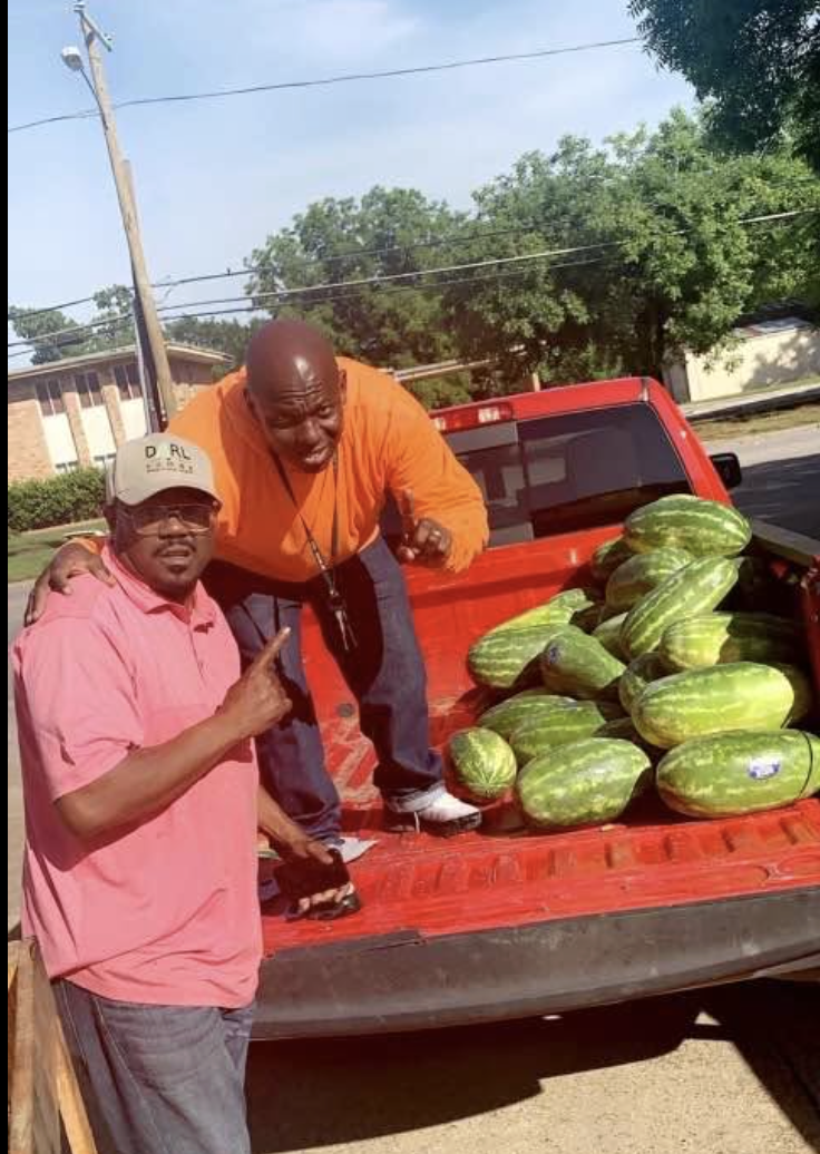 Supporters at the truck with a load of watermelon